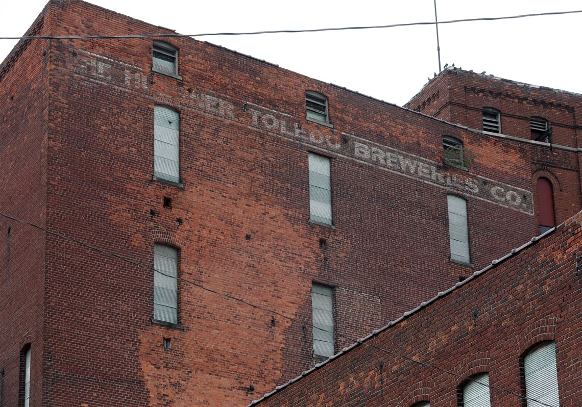 The buildings still stand today with the Huebner name still visible on the Swan Creek side